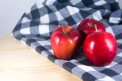 Close-up of apples on table