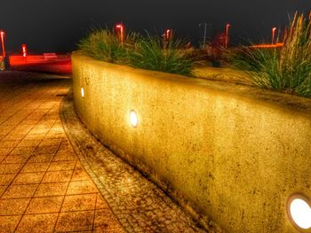 Illuminated road at night