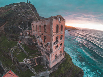 Old ruin building by sea