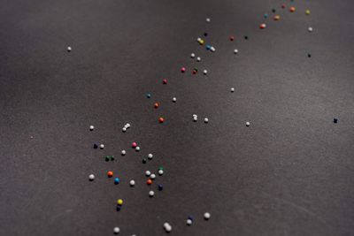 High angle view of multi colored balloons on floor