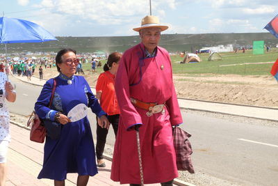 Group of people walking outdoors