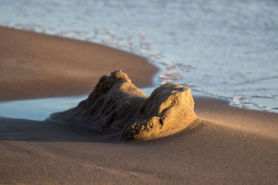 Scenic view of rocks on beach