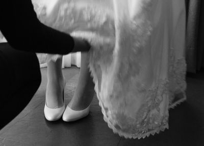 Low section of woman standing on floor