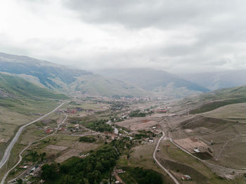 High angle view of road amidst landscape against sky