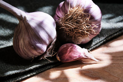 Purple garlic on table