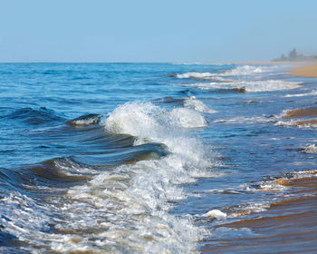 Scenic view of sea against clear sky