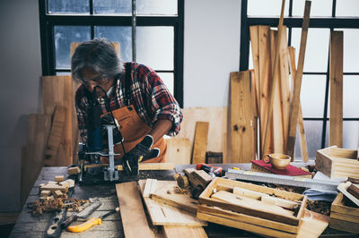 Man working on wood