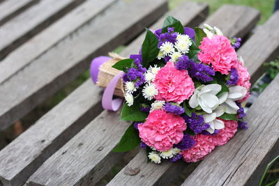 High angle view of flowers on wood