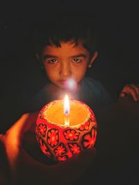 Portrait of mid adult man in darkroom