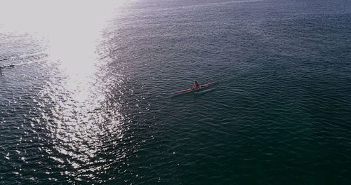 High angle view of people on sea