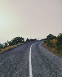 Empty country road along landscape