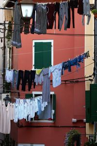 Clothes drying against built structures