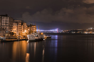 View of illuminated city at waterfront