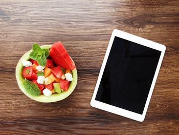 High angle view of fruit salad in plate on table