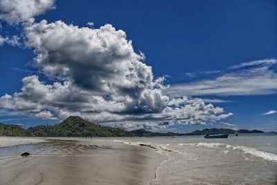 Scenic view of beach against sky