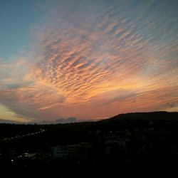 View of cityscape at sunset