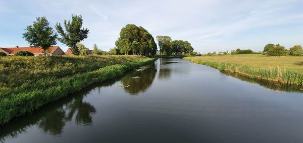 Scenic view of moat against sky