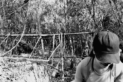 Young woman hiking in forest