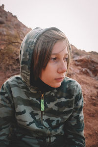 Portrait of teenage girl looking away