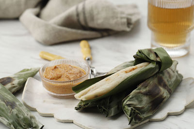 Otak-otak tengiri with peanut sauce, made from fish and flour