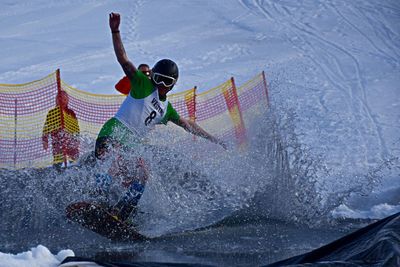 Man snowboarding in water