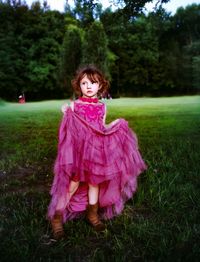 Girl standing on field