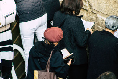 High angle view of people standing on street