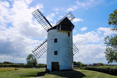 Built structure on field against sky old windmill in ashton somerset 