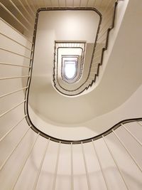 Low angle view of spiral staircase in building