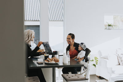 Couple sitting on table