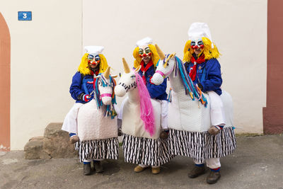 Basel carnival. basel, switzerland - feb 21st, 18. portrait of three participants in horse costumes