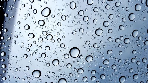 Close-up of water drops on glass