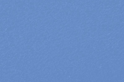 Full frame shot of snow against blue sky