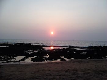 Scenic view of sea at sunset