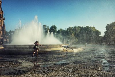 Tourists enjoying in fountain