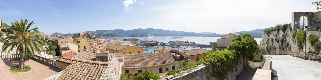 Panoramic view of townscape by sea