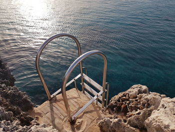 High angle view of swimming pool by lake