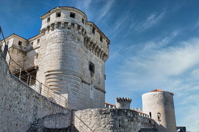 Low angle view of historic building against sky