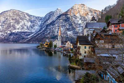 View of the famous hallstatt town at the lake with mountain ranges in background