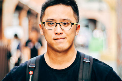 Portrait of handsome man in city