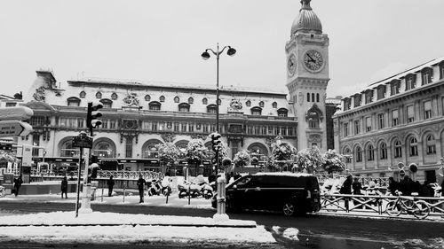 People in front of building