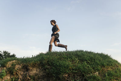 Woman runs down the hill