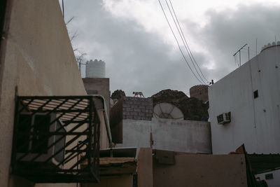 Low angle view of buildings against sky