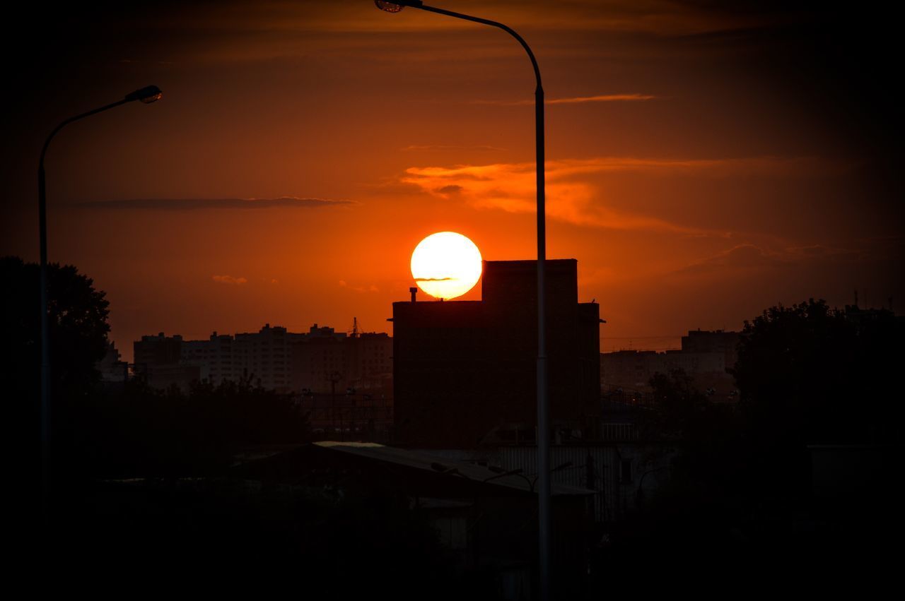 VIEW OF CITY AT SUNSET