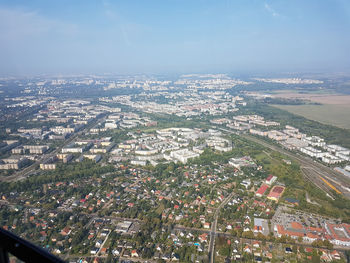 High angle view of city buildings against sky