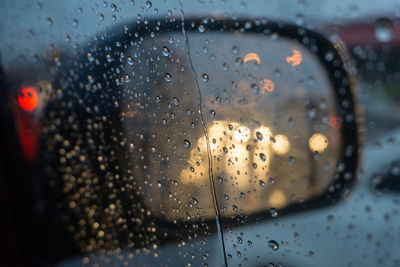 Close-up of wet car window