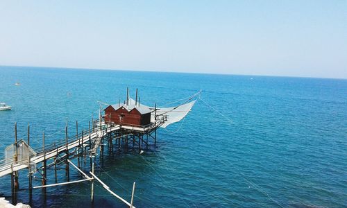 Scenic view of sea against blue sky