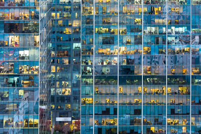 Full frame of modern glass building in city