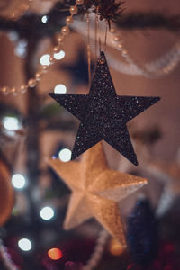 Close-up of christmas decoration hanging on tree