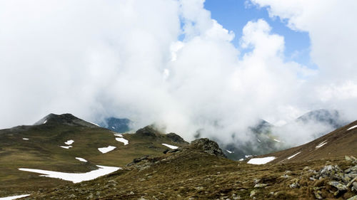 Scenic view of snowcapped mountains against sky